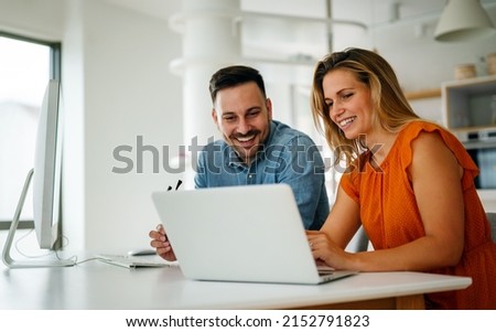 Portrait of success business people working together in home office. Couple teamwork startup concept Royalty-Free Stock Photo #2152791823