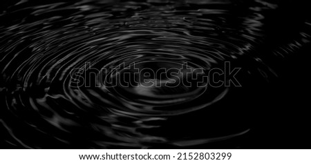 Abstract black oil background. background of black water. Dark water. Water Ripple. Dark luxury texture. Oil, petroleum, rock-oil. Silk, satin. Black tar, gum. water wave.