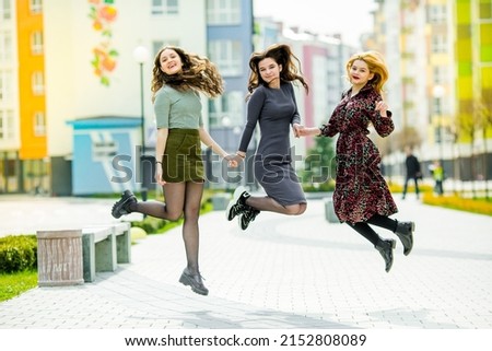 Shared photos of teenagers or high school students. Holidays in schools. Summer photos of schoolchildren or students. Girls and boys are cheerful and happy in the photo. All brands are hidden.