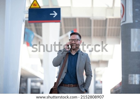 Businessman with smart phone stock photo