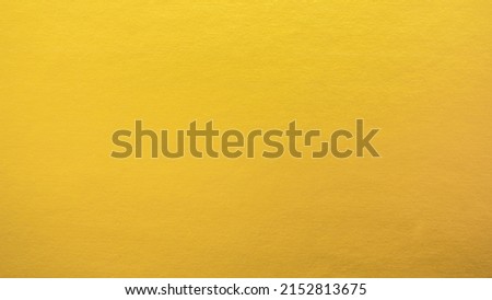 Gradation gold foil leaf shiny with sparkle yellow metallic texture background.
Abstract paper glitter golden glossy for template.
top view. Royalty-Free Stock Photo #2152813675