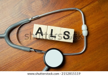 the acronym als for Amyotrophic Lateral Sclerosis concept represented by wooden letter Royalty-Free Stock Photo #2152815119