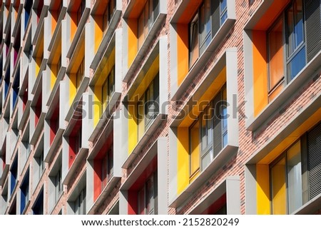 Diagonal photo of a colorful brick building