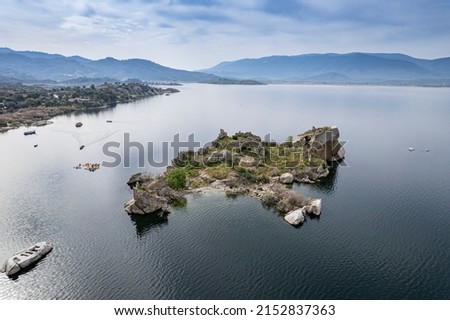 Lake Bafa is a lake and a nature reserve situated in southwestern. At the innermost north-east tip of the lake is the village of Kapikiri, as well as the ruins of Heraclea by Latmus.