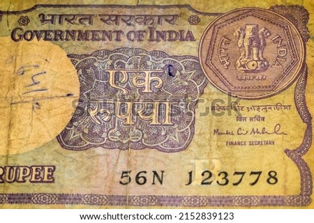 Old One Rupee notes combined on the table, India money on the rotating table. Old Indian Currency notes on a rotating table, Indian Currency on the table Royalty-Free Stock Photo #2152839123