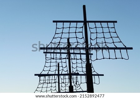 silhouette of a pirate ship in the playground