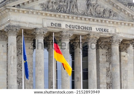 The Reichstag building (Bundestag) in Berlin, Germany, meeting place of the German parliament: The inscription says: Dem Deutschen Volke - To the German people Royalty-Free Stock Photo #2152893949