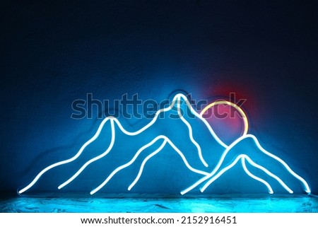 Blue neon sign mountains and sun. Trendy style. Neon sign. Custom neon. Home decor.