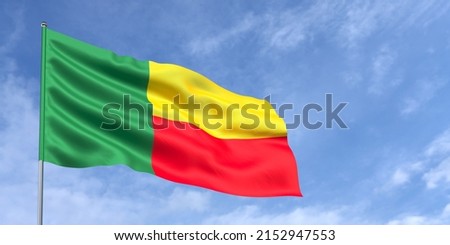 Benin flag on flagpole on blue sky background. Benin flag fluttering in the wind against a sky with white clouds. Place for text. 3d illustration.