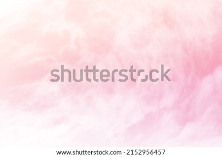 Pink sky with white cloud. The sky before a large storm. Sweet dream background.