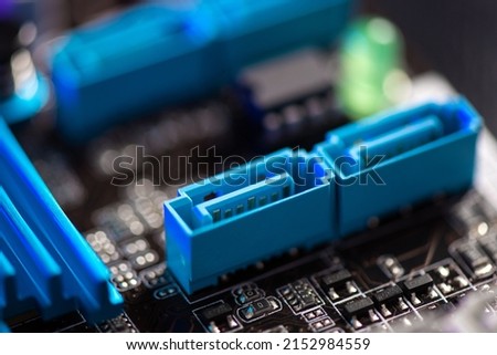 Close up Serial ATA(SATA) connector on computer motherboard. SATA is an interface for transferring data between a motherboard and mass storage devices. Royalty-Free Stock Photo #2152984559
