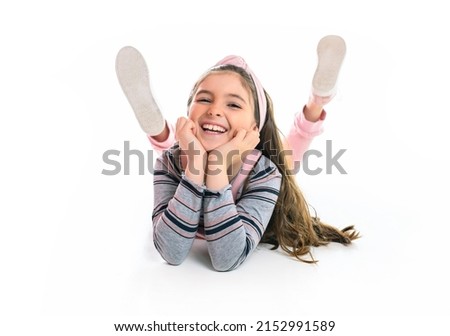 A cute child over white background on studio