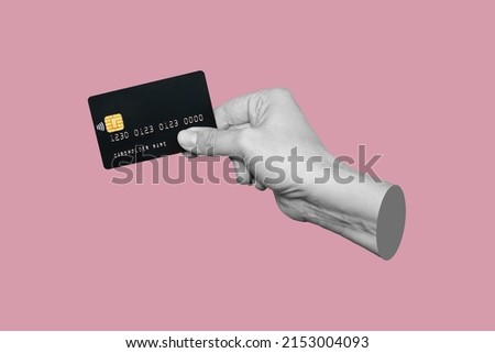 A hand holding a black plastic credit card with blank for text isolated on a pink background. Shopping, payment for purchases, banking operations. 3d trendy contemporary art. Modern design. Mockup