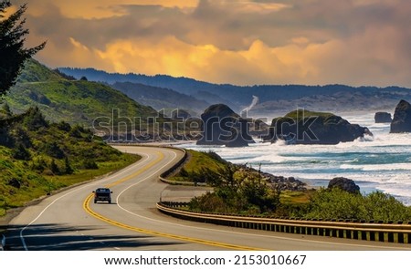 US Highway 101 and ocean sea stacks near the town of Gold Beach on the Oregon coast Royalty-Free Stock Photo #2153010667