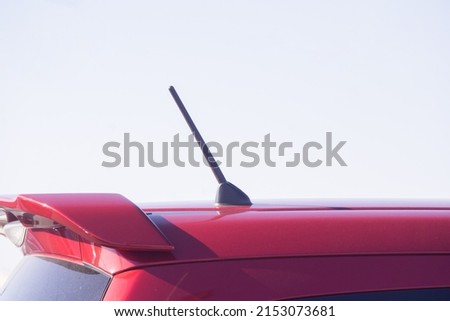 closeup car rear spoiler and car roof antenna Royalty-Free Stock Photo #2153073681