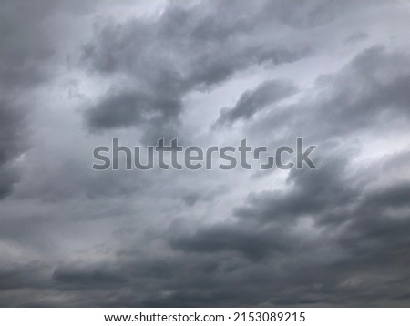 Full frame Dusk overcast sky before to rainy.Overcast sky in rainy season. Rain cloudy floating on sky frame. Copy space for text or word to do background work. Royalty-Free Stock Photo #2153089215