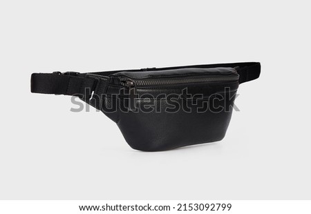 Side view on Fashion unisex business Office Waist Belt Leather Black Banana Bag bumbag with zipper for men on isolated White Background, mockup Royalty-Free Stock Photo #2153092799