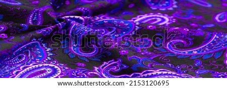 Paisley blue pattern on black background In Chinese it is known as “ham pattern” In Russia this ornament is known as “cucumbers”. Boteh is a Persian word meaning bush, bunch of leaves or flower bud