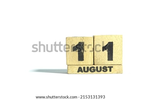 August 11. 11th day of the month, wooden calendar isolated on a white background with shadow.