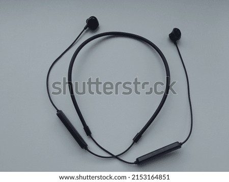 a sporty black bluetooth headset