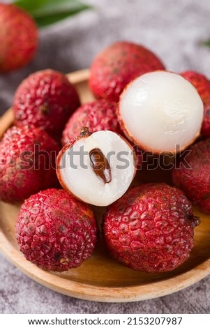 fresh litchi, lichee, lychee fruit on table Royalty-Free Stock Photo #2153207987