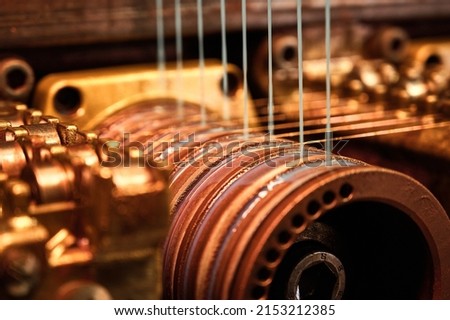 Coil winder machine with jackshafts copper wire drawing die Royalty-Free Stock Photo #2153212385