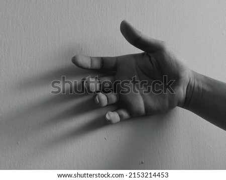 light and shadow photos, hand photography art, expressing feelings through hands, motion of hands