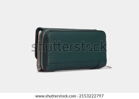 Side view on Emerald green women's Wallet Purse clutch. Leather Pouch for women ladies with zipper isolated on white background Royalty-Free Stock Photo #2153222797