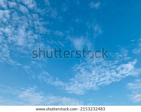 Altocumulus clouds are full of streaks white of beautiful usually appear between lower stratus clouds and higher cirrus clouds photographed over at Thailand.no focus Royalty-Free Stock Photo #2153232483