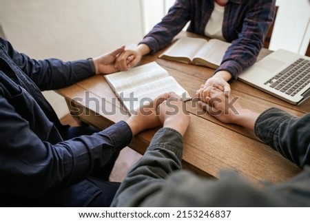 Praying with hands and praying together with religious faith and belief in god on blessing background The power of hope or love and devotion. Royalty-Free Stock Photo #2153246837