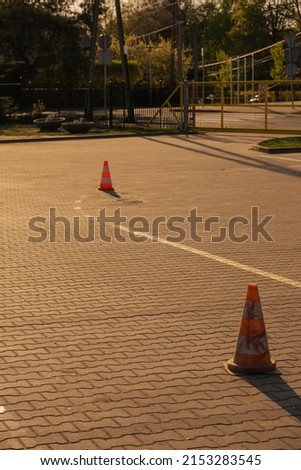 Road cones. Driving lesson. Attributes of a driving school.