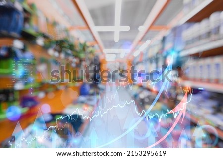 Red up arrow on blur image of supermarket background. Charts and graphs. Stock Market. Shop.