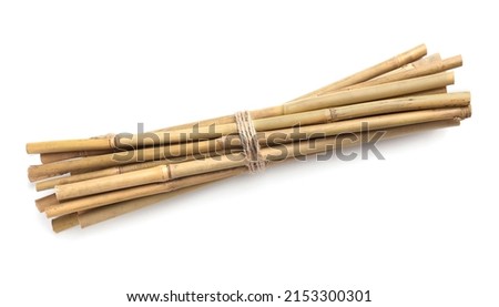 Bunch of dry bamboo sticks on white background, top view Royalty-Free Stock Photo #2153300301