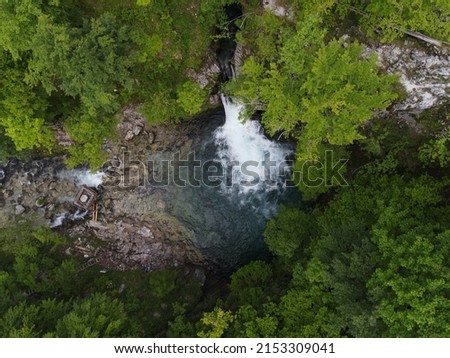 Blue Eye Theth Lake Waterfall in Theth (Thethi) National Park in north of Albania, beautiful place with cold blue water and green forest around, aerial footage on the drone from above
 Royalty-Free Stock Photo #2153309041