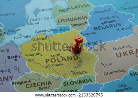 Poland location on map with red thumbtack, travel idea, Warsaw and Poland on map with a red fastener, vacation and road trip concept, pinned destination, top view Royalty-Free Stock Photo #2153320795