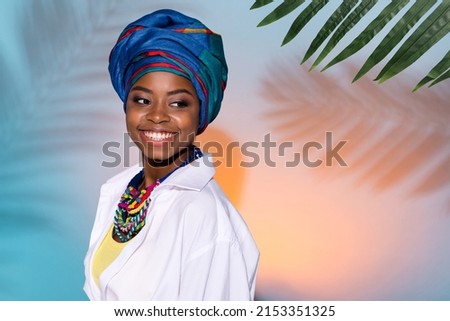Photo of cute lady wear tribal accessories headwrap look empty space forest isolated colorful teal background