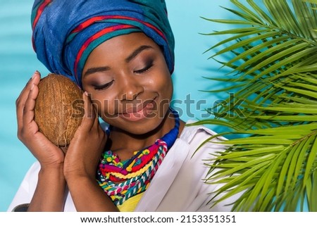 Close up photo of lady farmer exotic agriculture coco ripe wear accessories headwrap isolated teal color background