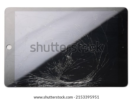 Cracked screen on tablet PC. Broken glass display. Damage accidentally touch screen on smartphone. Repair lcd cracked screen phone or computer. Macro high resolution photo. Isolated white background