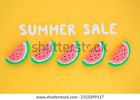 Slices of watermelon and lettering Summer sale on yellow background. Banner with percentage sign. Promotion of the poster sale or percent discount in the store. Mock up, top view, flatlay concept
