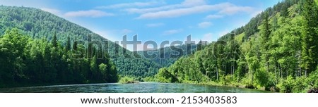 Geography. Middle Siberia (south part). Panorama of powerful rivers and taiga forests, summer, Typical coniform hill oreography (bald peak). - absence of people and virginal natural area Royalty-Free Stock Photo #2153403583