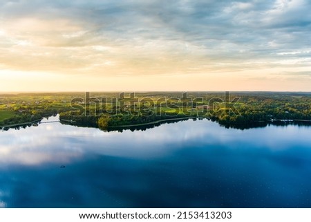 Beautiful aerial view of lake Galve, favourite lake among water-based tourists, divers and holiday makers, located in Trakai, Lithuania. Royalty-Free Stock Photo #2153413203
