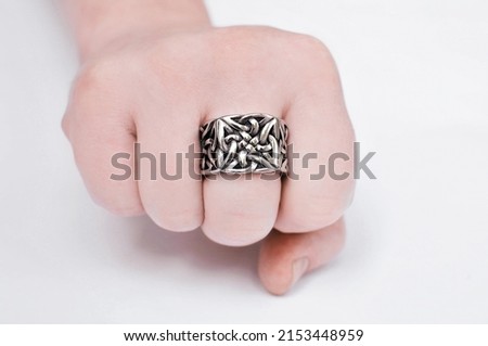 Ring worn on the finger. Awesome metal accessory. Heavy metal stylish attribute. Rock style ring.