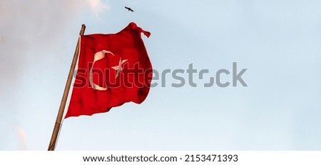 Huge Turkey flag waving in the evening at wind