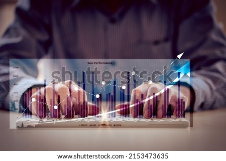 Businessman, Analysis and Technology, Finance and Banking Chart from laptop computer using creative backlit hologram keyboard with charts and tables on the global economy and stock concept background.