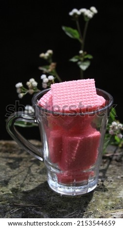 Pink wafer in glass bowl, strawberry flavor, crunchy, savory, snack, delicious cake, layered, sweet food tasty,