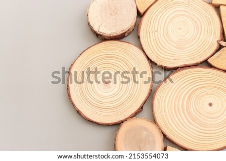 Wooden logs over gray background, eco and spa concept