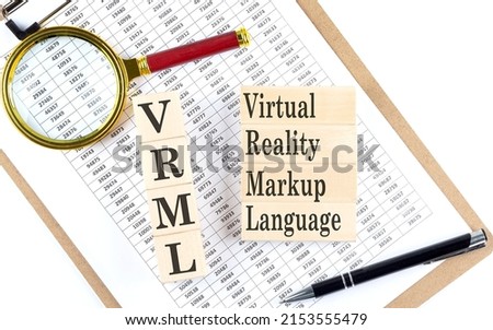 VRML - Virtual Reality Markup Language text on wooden block on a chart background