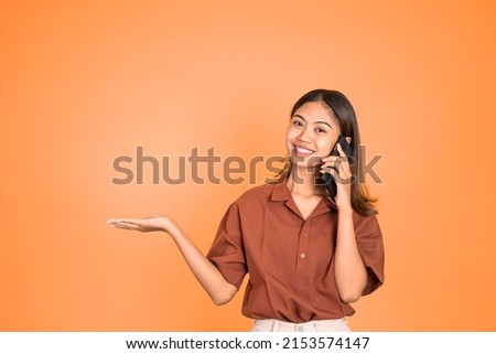 woman call on mobile phone with hand gesture presenting something on isolated background