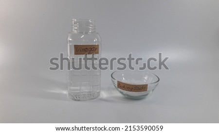 Vinegar and Baking soda on white background