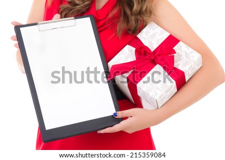 woman holding clipboard with copyspace and gift box isolated on white background
